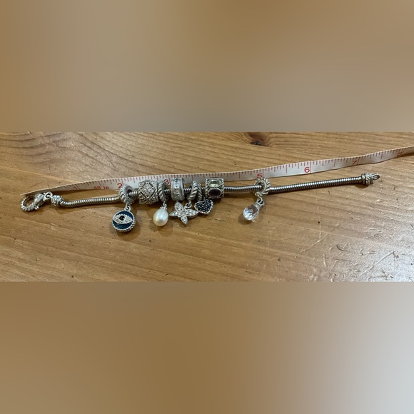 Judith Ripka: 8 cubic zirconia charms on a sterling silver (925) bracelet. - Picture 6 of 6